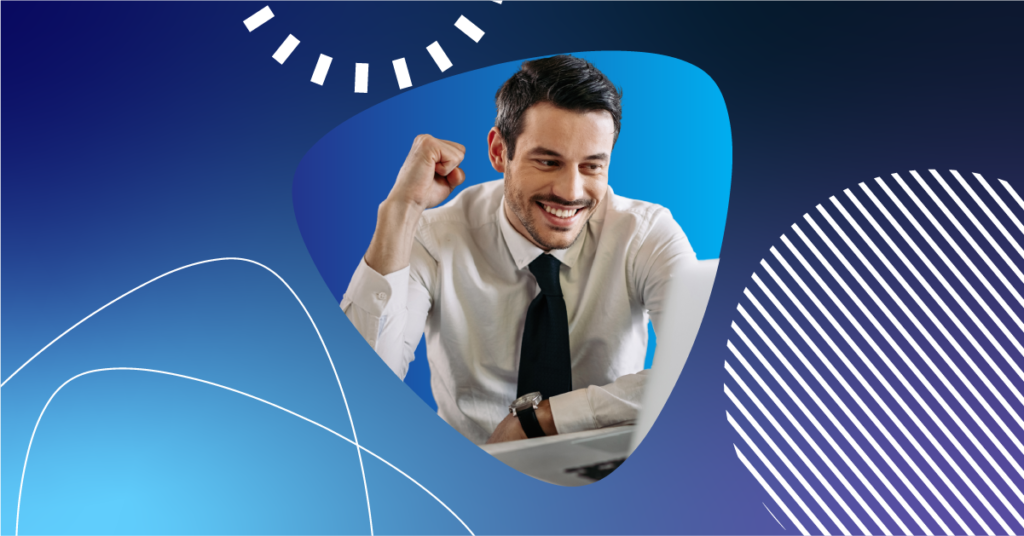 Smiling business professional celebrates a success while working at a laptop, symbolizing clarity and satisfaction with Microsoft licensing.