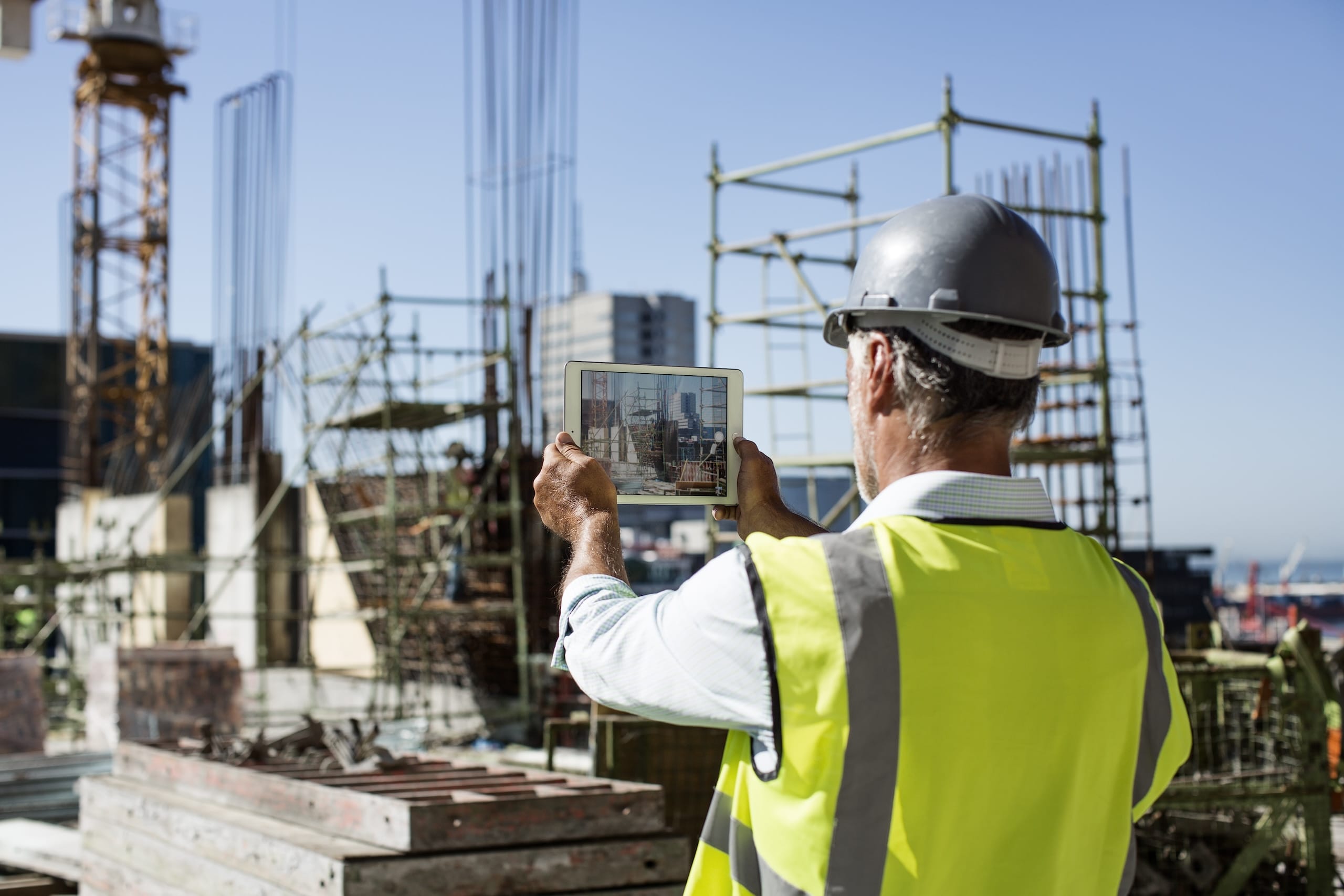 architect photographing construction site