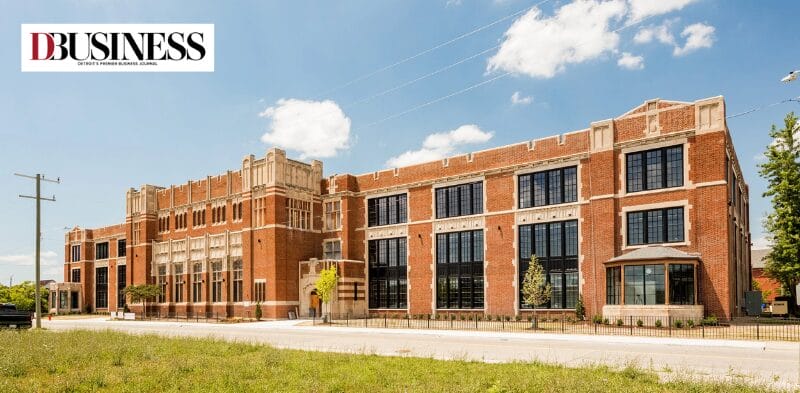 Exterior photo of The Jefferson Hub, where Apex Digital Solutions is establishing its new headquarters and Experience Center, with the DBusiness Magazine logo.